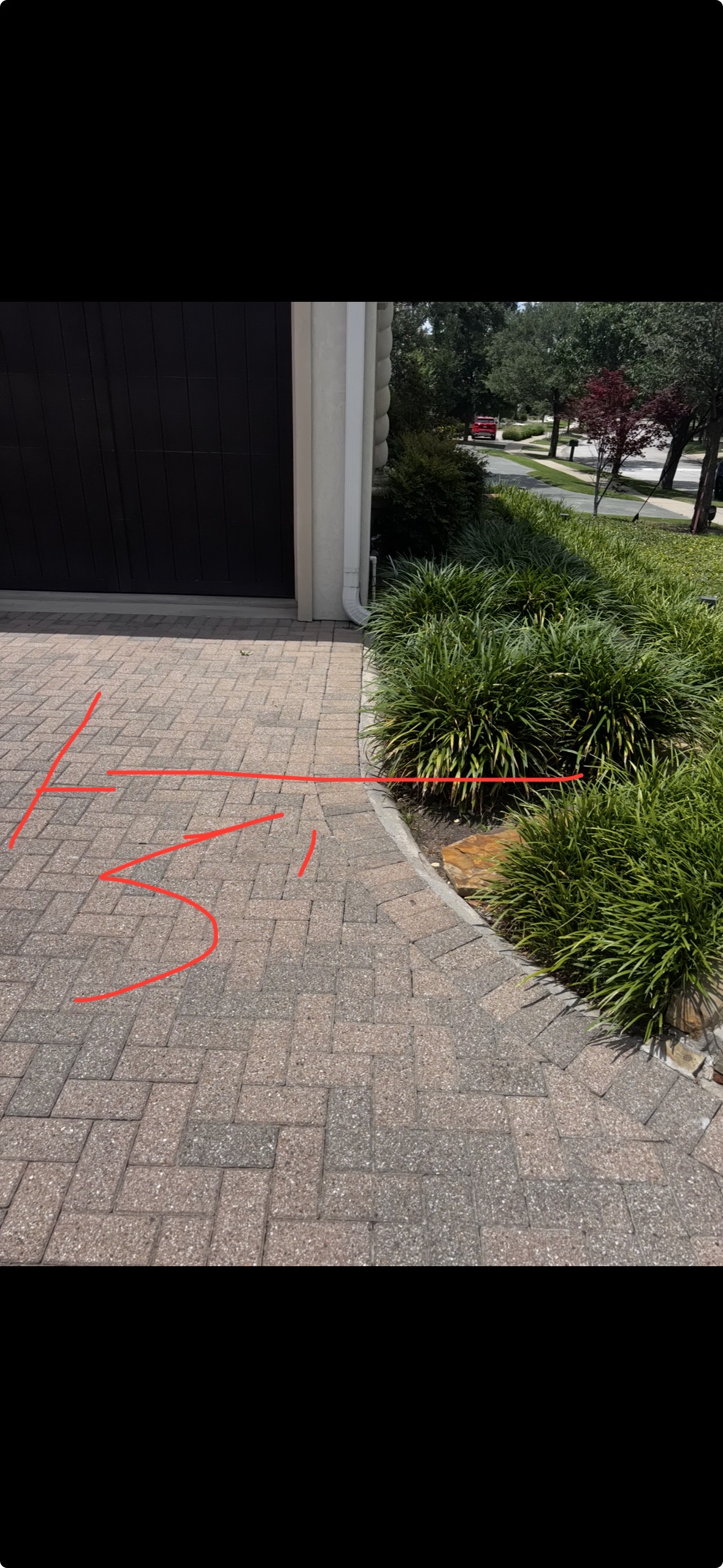 Approximate driveway brick and sewer cleanout direction at 4762 Byron Circle Irving Texas